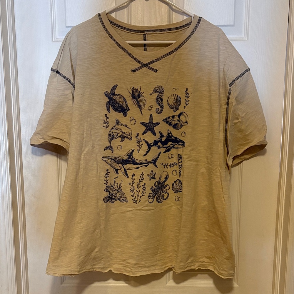 Beige Graphic Tee with Sea Life Design and Navy Stitching From SHEIN Curve.